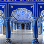 Blue fresco palace interior in Jaipur experienced during a Golden Triangle shore excursion in India