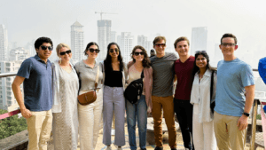 Happy tour group at Mumbai city viewpoint during a guided Highlights of Mumbai sightseeing tour