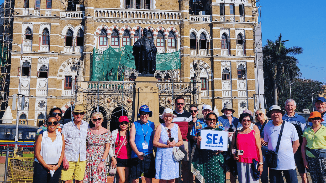 Mumbai Shore Excursions Guide Tour group photo in front of Chhatrapati Shivaji Maharaj Terminus during a guided Mumbai sightseeing tour