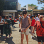 Travel group walking with local guide during a Mumbai guided city sightseeing tour